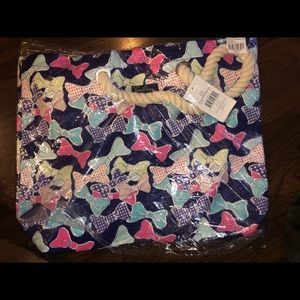 Lauren James “bow beach bag”